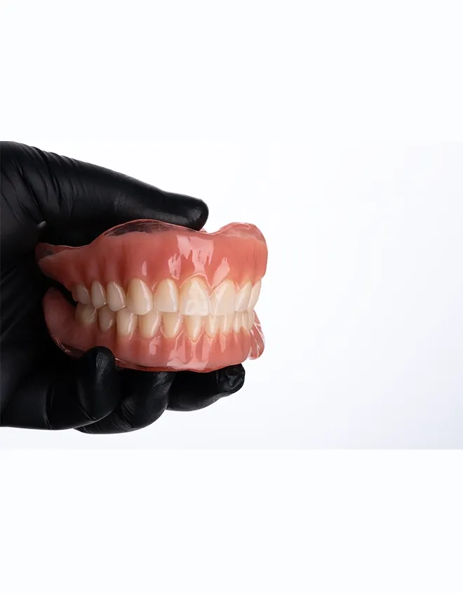 Dentures vs. Dental Implants: Pros, Cons, and Costs